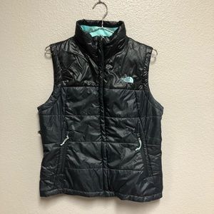 Black/turquoise North Face vest